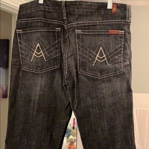 Faded black demin boot cut jeans